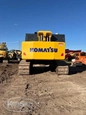 Back of used Excavator,Used Komatsu,Side of used Komatsu Excavator,Used Komatsu under sun,Side of used Excavator